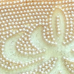 Vintage clutch covered in pearls